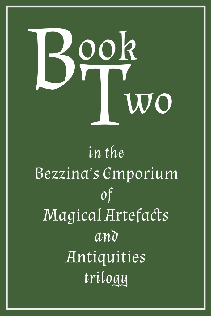 White on green book cover graphic with white text and white border, reading 'Book Two in the Bezzina's Emporium of Magical Artefacts and Antiquities trilogy.'